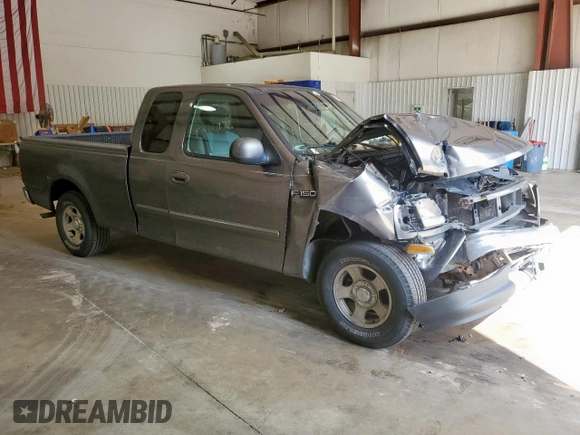 2002 Ford F-150 XL with VIN 1FTRX17212NB63939, listed as a Copart auction lot 62728225 with Not provided miles and Salvage title. Bid and sale history available at DreamBid. Image 4.