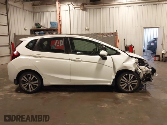 2015 Honda Fit EX-L with VIN 3HGGK5H88FM776996, listed as a IAAI auction lot 42431688 with 50,566 mi miles and . Bid and sale history available at DreamBid. Image 14.