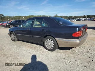 1998 Mercedes-Benz E 320 with VIN WDBJF25F3WA578364, listed as a Copart auction lot 77551834 with 228,913 mi miles and Salvage Title. Bid and sale history available at DreamBid. Image 2.