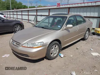2002 Honda Accord EX z VIN 1HGCG16502A014058, wystawiony jako IAAI lot #42030847 z przebiegiem 160 708 mil mil oraz . Historia ofert i sprzedaży dostępna na DreamBid. Obrazek 2.