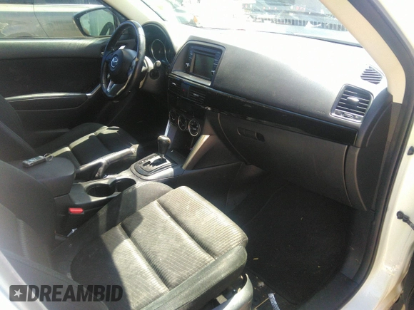 2014 Mazda CX-5 Touring with VIN JM3KE2CY7E0364311, listed as a IAAI auction lot 42108176 with 90,506 mi miles and . Bid and sale history available at DreamBid. Image 5.
