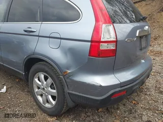 2009 Honda CR-V EX-L with VIN JHLRE48719C007622, listed as a IAAI auction lot 41999801 with 158,976 mi miles. Bid and sale history available at carsss.com. Image 6.