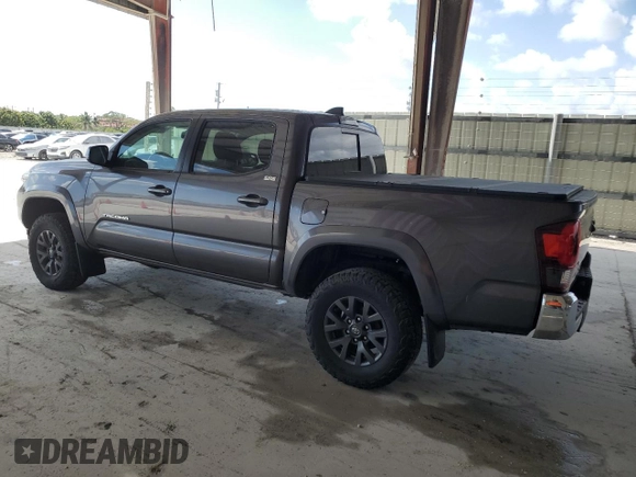 2021 Toyota Tacoma 4WD SR with VIN 3TYCZ5AN3MT028022, listed as a Copart auction lot 54816665 with 36,204 mi miles and Salvage Title. Bid and sale history available at carsss.com. Image 2.