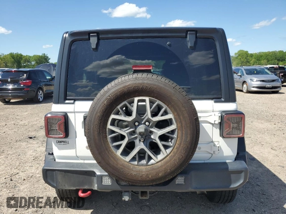2018 Jeep Wrangler Unlimited Rubicon z VIN 1C4HJXFN3JW176213, wystawiony jako Copart lot #53963755 z przebiegiem 53 094 mil mil oraz Szkoda całkowita • Salvage title. Historia ofert i sprzedaży dostępna na DreamBid. Obrazek 6.