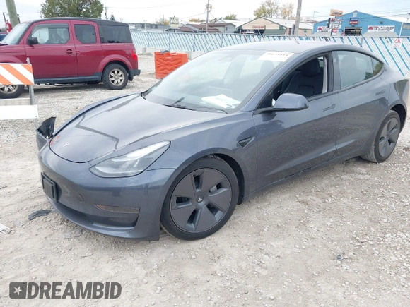 2023 Tesla Model 3 z VIN 5YJ3E1EA3PF699724, wystawiony jako IAAI lot #40654814 z przebiegiem Nie podano mil oraz . Historia ofert i sprzedaży dostępna na DreamBid. Obrazek 18.