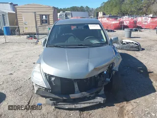 2012 Nissan Versa S with VIN 3N1BC1CPXCL364399, listed as a IAAI auction lot 41698536 with 258,701 mi miles. Bid and sale history available at carsss.com. Image 12.