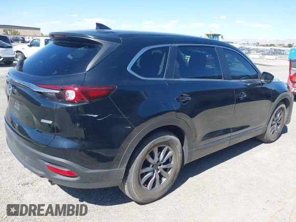 2018 Mazda CX-9 Sport with VIN JM3TCABY8J0223750, listed as a IAAI auction lot 42155429 with 133,543 mi miles and . Bid and sale history available at DreamBid. Image 4.