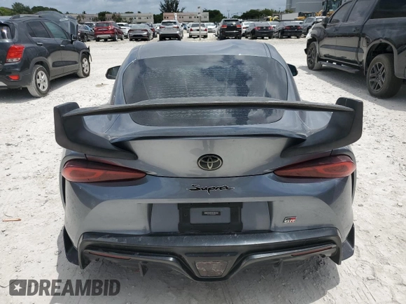 2020 Toyota Supra 3.0 with VIN WZ1DB4C02LW030327, listed as a Copart auction lot 61451485 with 85,250 mi miles and Salvage title. Bid and sale history available at DreamBid. Image 6.