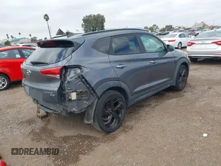 2016 Hyundai Tucson Eco with VIN KM8J3CA28GU217033, listed as a IAAI auction lot 41476238 with 76,311 mi miles. Bid and sale history available at carsss.com. Image 4.