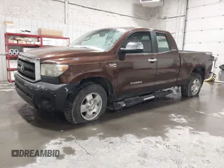 2007 Toyota Tundra SR5 with VIN 5TFBT54187X007232, listed as a IAAI auction lot 41848302 with 168,324 mi miles and . Bid and sale history available at DreamBid. Image 2.