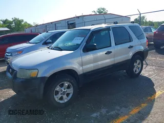 2005 Ford Escape XLT with VIN 1FMYU03175DA18437, listed as a IAAI auction lot 42567091 with 207,602 mi miles and . Bid and sale history available at DreamBid. Image 2.