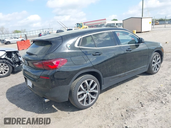 2022 BMW X2 sDrive28i z VIN WBXYH9C00N5U57853, wystawiony jako IAAI lot #41958326 z przebiegiem 49 518 mil mil oraz . Historia ofert i sprzedaży dostępna na DreamBid. Obrazek 4.