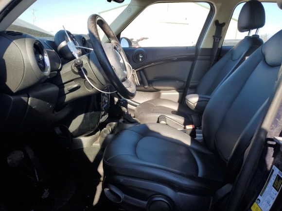 2011 MINI Cooper Countryman with VIN WMWZB3C53BWM00139, listed as a Copart auction lot 42623315 with 150,439 mi miles and Salvage Title. Bid and sale history available at carsss.com. Image 7.