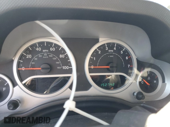 2010 Jeep Wrangler Unlimited Sahara with VIN 1J4BA5H19AL171369, listed as a Copart auction lot 50412855 with 152,742 mi miles and Salvage Title. Bid and sale history available at carsss.com. Image 9.