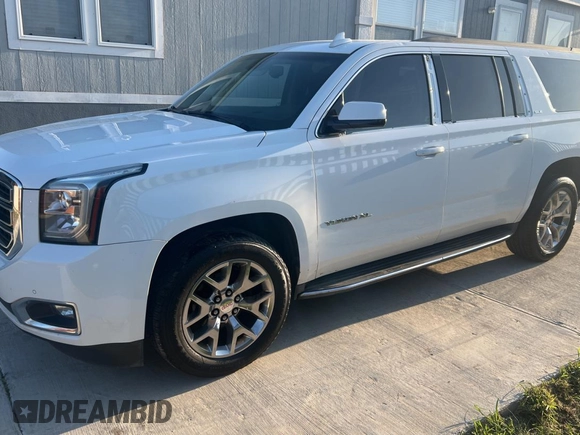 2016 GMC Yukon XL SLE with VIN 1GKS1FKC4GR126775, listed as a Copart auction lot 52828325 with 110,002 mi miles and Clean Title. Bid and sale history available at carsss.com. Image 2.