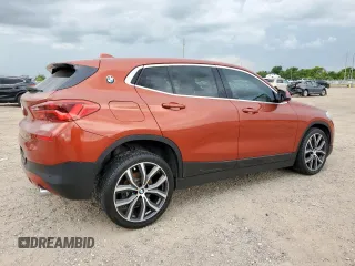 2018 BMW X2 sDrive28i with VIN WBXYJ3C37JEJ75893, listed as a Copart auction lot 62513565 with 62,029 mi miles and Salvage title. Bid and sale history available at DreamBid. Image 3.