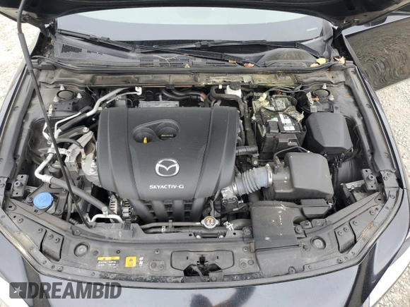 2021 Mazda 3 2.0 z VIN 3MZBPAA7XMM203287, wystawiony jako Copart lot #60079135 z przebiegiem 49 212 mil mil oraz Szkoda całkowita • Salvage title. Historia ofert i sprzedaży dostępna na DreamBid. Obrazek 11.