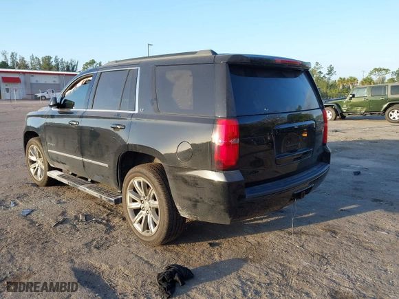 2018 Chevrolet Tahoe LT with VIN 1GNSCBKC1JR365875, listed as a IAAI auction lot 41584072 with 61,957 mi miles. Bid and sale history available at carsss.com. Image 3.