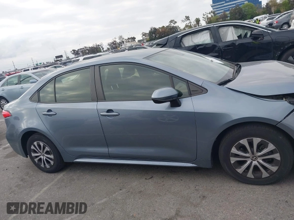 2022 Toyota Corolla Hybrid LE with VIN JTDEAMDE4NJ041913, listed as a IAAI auction lot 41883490 with 23,063 mi miles. Bid and sale history available at carsss.com. Image 13.