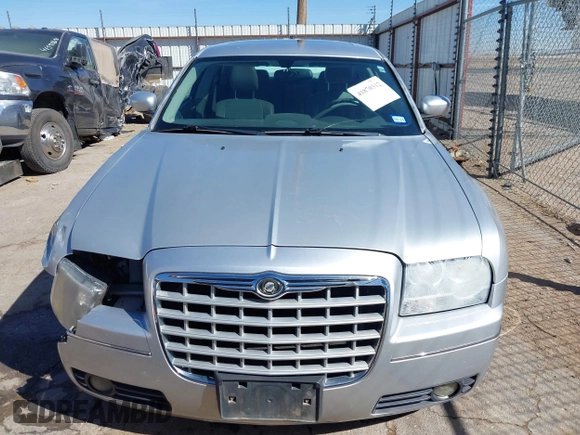 2006 Chrysler 300 Touring with VIN 2C3KA53G86H111027, listed as a IAAI auction lot 41870312 with 59,870 mi miles. Bid and sale history available at carsss.com. Image 11.
