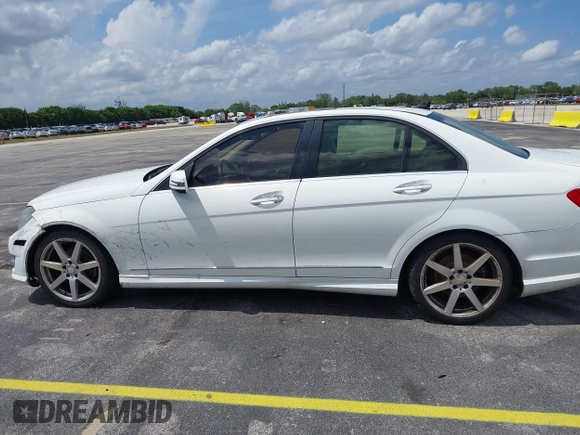 2014 Mercedes-Benz C 250 Sport with VIN WDDGF4HB0EG255701, listed as a IAAI auction lot 42213602 with 107,102 mi miles and . Bid and sale history available at carsss.com. Image 14.