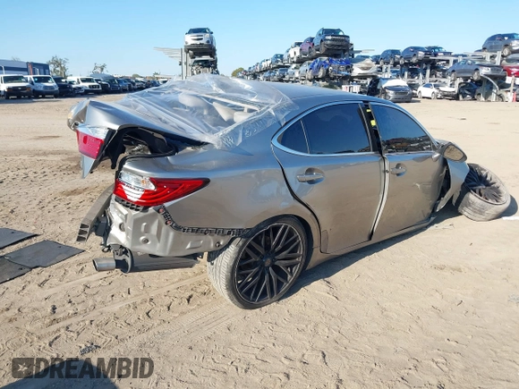 2015 Lexus ES with VIN JTHBK1GG7F2190161, listed as a IAAI auction lot 41343260 with 127,460 mi miles. Bid and sale history available at carsss.com. Image 4.