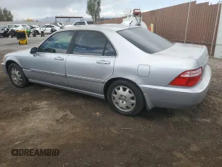 2004 Acura RL w/Navigation System z VIN JH4KA966X4C006574, wystawiony jako Copart lot #52045205 z przebiegiem 123 767 mil mil oraz Tytuł czysty. Historia ofert i sprzedaży dostępna na DreamBid. Obrazek 2.