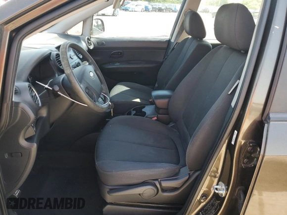 2010 Kia Rondo LX with VIN KNAHG8C84A7299898, listed as a Copart auction lot 53477175 with 127,990 mi miles and Salvage Title. Bid and sale history available at carsss.com. Image 7.