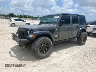 2020 Jeep Wrangler Unlimited Freedom with VIN 1C4HJXDG3LW274780, listed as a Copart auction lot 61870755 with 62,709 mi miles and Salvage title. Bid and sale history available at DreamBid. Image 1.
