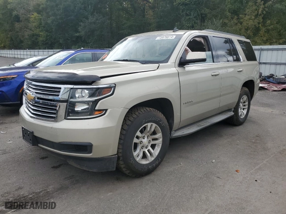 2015 Chevrolet Tahoe LS with VIN 1GNSKAKCXFR106192, listed as a Copart auction lot 73876014 with 178,406 mi miles and Salvage Title. Bid and sale history available at carsss.com. Image 1.