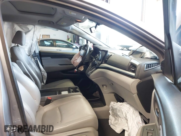 2018 Honda Odyssey EX-L z VIN 5FNRL6H70JB059653, wystawiony jako IAAI lot #42324330 z przebiegiem 115 623 mil mil oraz . Historia ofert i sprzedaży dostępna na DreamBid. Obrazek 5.
