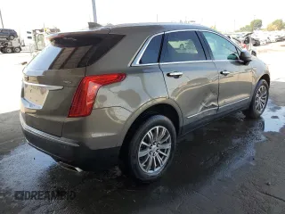 2019 Cadillac XT5 Luxury FWD z VIN 1GYKNCRS4KZ221304, wystawiony jako Copart lot #54995415 z przebiegiem 128 940 mil mil oraz Szkoda całkowita • Salvage title. Historia ofert i sprzedaży dostępna na DreamBid. Obrazek 3.