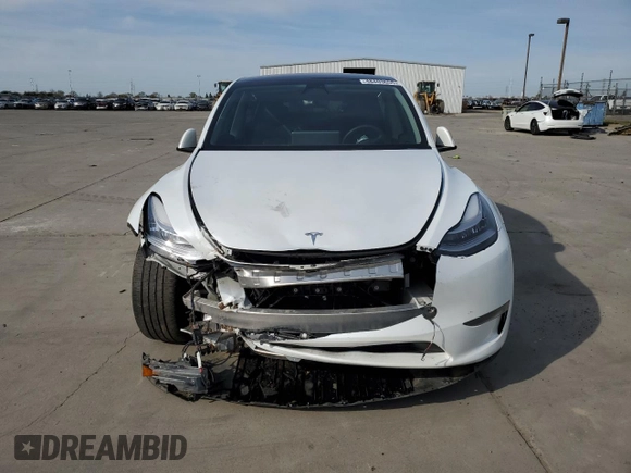2023 Tesla Model Y Long Range z VIN 7SAYGDEE2PA065048, wystawiony jako Copart lot #48403655 z przebiegiem 56 553 mil mil oraz Szkoda całkowita • Salvage title. Historia ofert i sprzedaży dostępna na DreamBid. Obrazek 5.