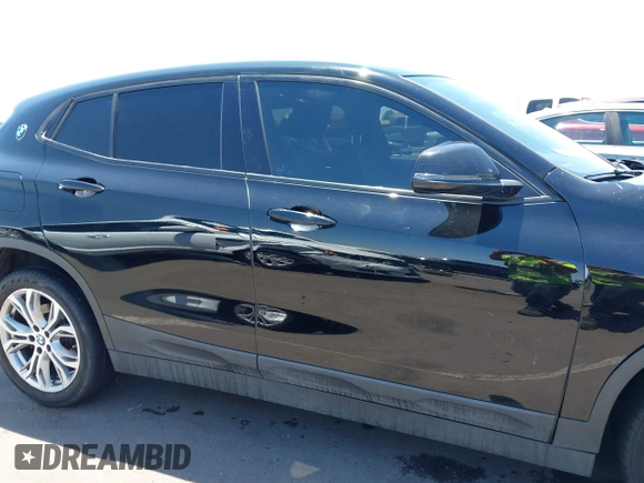 2018 BMW X2 sDrive28i with VIN WBXYJ3C35JEJ82700, listed as a IAAI auction lot 42675146 with 84,961 mi miles and . Bid and sale history available at DreamBid. Image 14.