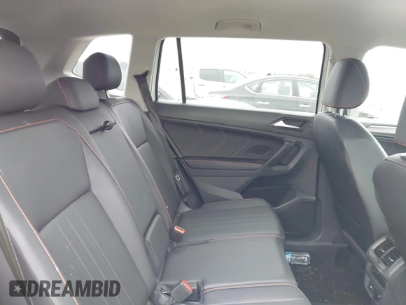 2024 Volkswagen Tiguan Wolfsburg Edition with VIN 3VV5B7AXXRM233917, listed as a IAAI auction lot 42780573 with 11,983 mi miles and . Bid and sale history available at DreamBid. Image 8.