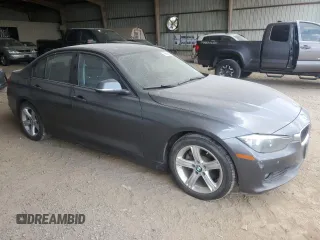 2014 BMW 3 Series 328i with VIN WBA3C1C55EK109175, listed as a Copart auction lot 60646514 with 143,347 mi miles and Salvage title. Bid and sale history available at DreamBid. Image 4.