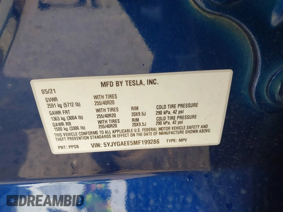 2021 Tesla Model Y Long Range with VIN 5YJYGAEE5MF199286, listed as a IAAI auction lot 41677915 with 52,500 mi miles. Bid and sale history available at carsss.com. Image 9.