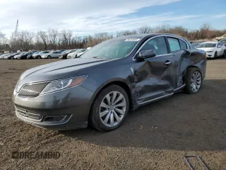 2016 Lincoln MKS z VIN 1LNHL9DK0GG601111, wystawiony jako Copart lot #88354865 z przebiegiem 96 298 mil mil oraz Szkoda całkowita • Salvage title. Historia ofert i sprzedaży dostępna na DreamBid. Obrazek 1.