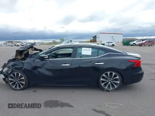 2016 Nissan Maxima SR z VIN 1N4AA6AP9GC386237, wystawiony jako IAAI lot #42166280 z przebiegiem 130 091 mil mil oraz . Historia ofert i sprzedaży dostępna na DreamBid. Obrazek 15.