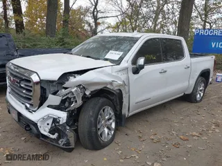 2019 GMC Sierra 1500 SLT with VIN 3GTU9DED3KG201853, listed as a IAAI auction lot 40678380 with 99,818 mi miles. Bid and sale history available at carsss.com. Image 2.