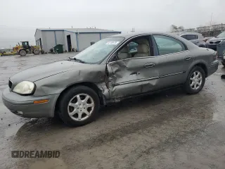 2001 Mercury Sable LS with VIN 1MEHM55SX1G608761, listed as a Copart auction lot 43158475 with 184,120 mi miles and Salvage Title. Bid and sale history available at DreamBid. Image 1.