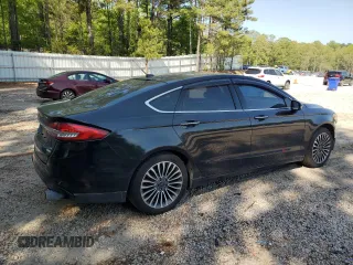 2017 Ford Fusion SE z VIN 3FA6P0H98HR328552, wystawiony jako Copart lot #52709395 z przebiegiem 188 451 mil mil oraz Szkoda całkowita • Salvage title. Historia ofert i sprzedaży dostępna na DreamBid. Obrazek 3.