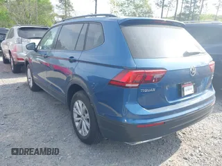 2018 Volkswagen Tiguan S with VIN 3VV0B7AXXJM018455, listed as a IAAI auction lot 41979115 with 92,104 mi miles and . Bid and sale history available at DreamBid. Image 3.
