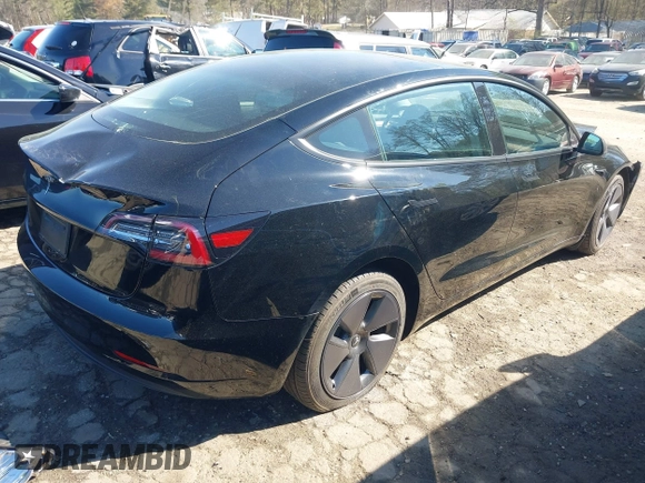 2023 Tesla Model 3 with VIN 5YJ3E1EA2PF482536, listed as a IAAI auction lot 41858110 with 6,298 mi miles. Bid and sale history available at carsss.com. Image 4.