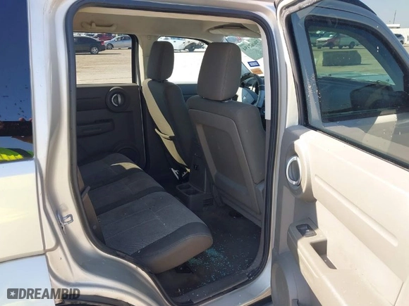 2009 Dodge Nitro SE with VIN 1D8GT28K99W513413, listed as a IAAI auction lot 39462494 with 196,456 mi miles. Bid and sale history available at carsss.com. Image 8.