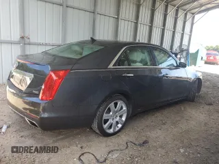 2014 Cadillac CTS Performance RWD with VIN 1G6AS5S37E0140091, listed as a Copart auction lot 60694094 with 130,587 mi miles and Salvage Title. Bid and sale history available at DreamBid. Image 3.