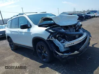 2021 Honda Passport Elite z VIN 5FNYF8H08MB028138, wystawiony jako IAAI lot #42214764 z przebiegiem 22 591 mil mil oraz . Historia ofert i sprzedaży dostępna na DreamBid. Obrazek 1.