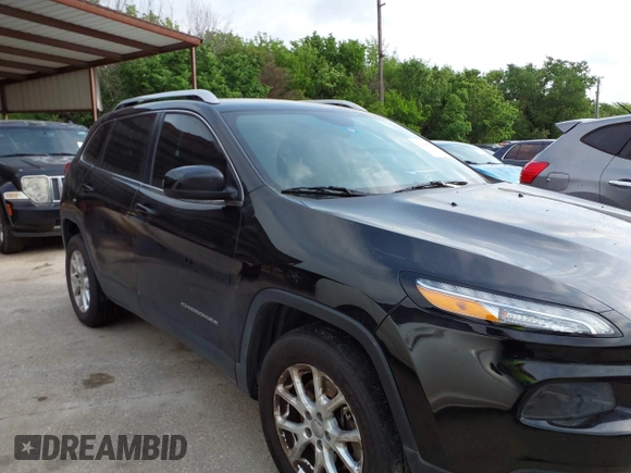 2014 Jeep Cherokee Latitude with VIN 1C4PJMCS5EW294743, listed as a IAAI auction lot 42098992 with 185,814 mi miles. Bid and sale history available at carsss.com. Image 14.