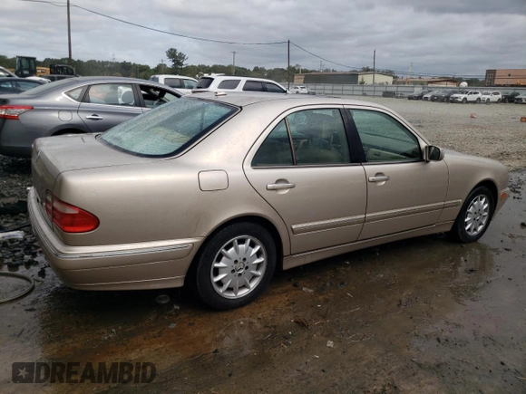 2001 Mercedes-Benz E-Class with VIN WDBJF65J01B389296, listed as a Copart auction lot 71933404 with 124,392 mi miles and Salvage Title. Bid and sale history available at carsss.com. Image 3.