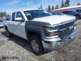 2018 Chevrolet Silverado 1500 LT with VIN 1GCVKREC6JZ266420, listed as a IAAI auction lot 41660687 with 86,656 mi miles. Bid and sale history available at carsss.com. Image 1.